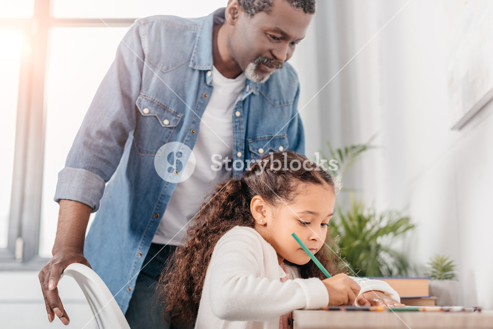 1000x667 african american girl drawing with father royalty free stock image - African American Girl Drawing