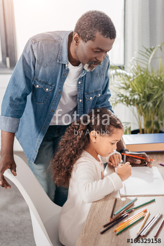 334x500 african american girl drawing with father stock photo and royalty - African American Girl Drawing