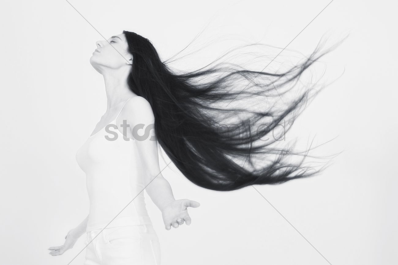 1300x867 woman with hair blowing in the wind stock photo - Blowing Hair Drawing