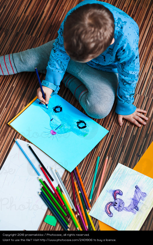 533x850 little boy drawing a colorful picture - Boy Drawing A Picture