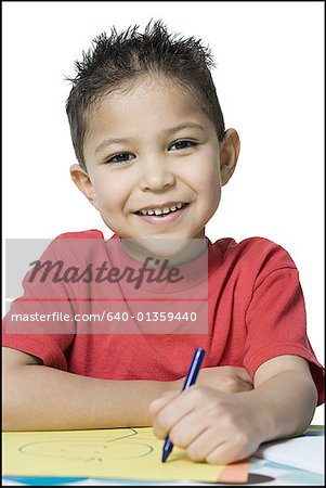 301x450 portrait of a boy drawing with crayons - Boy Drawing Picture