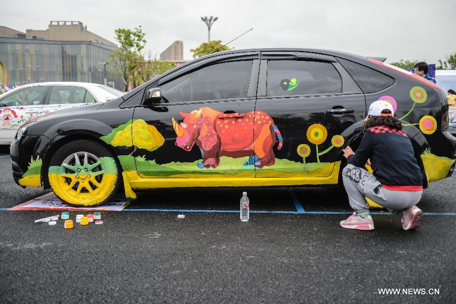 900x599 cars with colorful cartoon drawings parade in hangzhou - Cartoon Drawings Of Cars