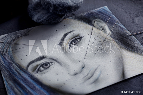 500x334 acupuncture needles on drawing of woman's face - Drawing Of Womans Face