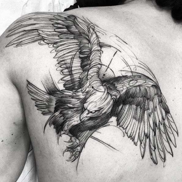 595x596 pencil sketch style flying eagle tattoo on back shoulder - Drawing Style Tattoo