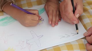 320x180 Person's Hand Drawing Plan On Blue Print Close Up Stock Video - Drawing Together