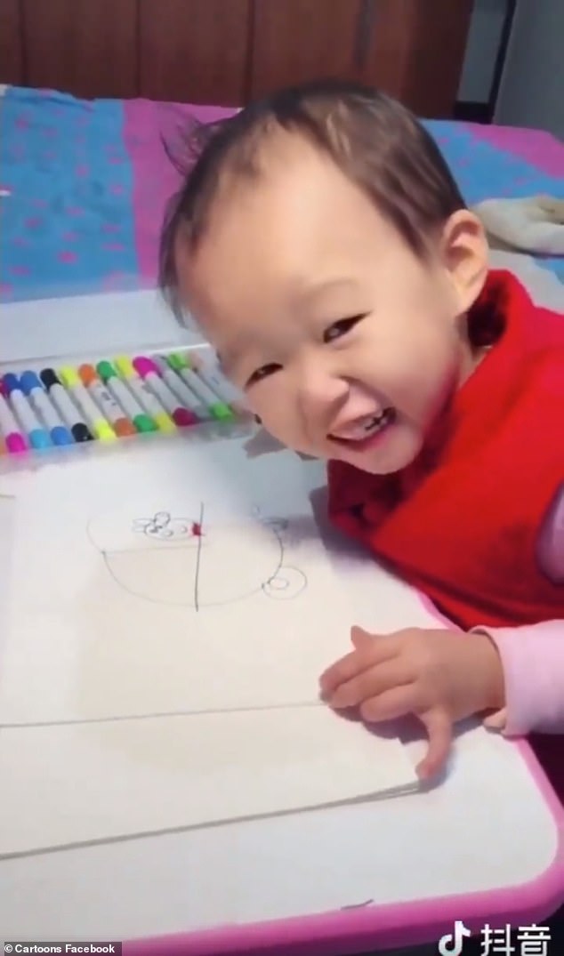 634x1075 incredible video of talented toddler drawing cartoons goes viral - Girl Drawing A Picture