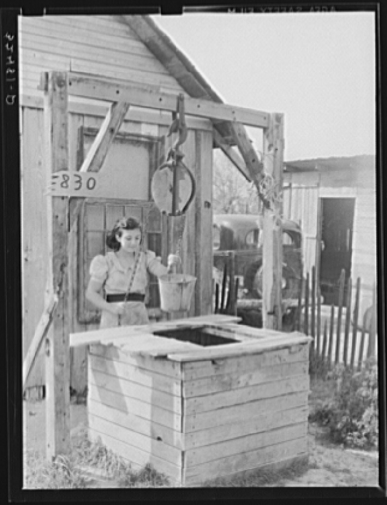 785x1024 Mexican Girl Drawing Water From Well City Water Is Not Supplied - Mexican Girl Drawing