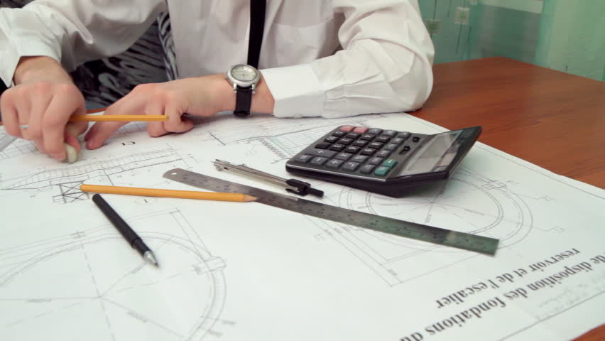 852x480 Young Engineer Behind A Table Stock Footage Video - Office Drawings