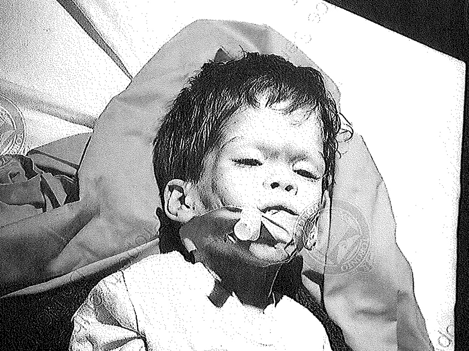 940x705 the sad stories of two little boys national post - Sad Little Boy Drawing