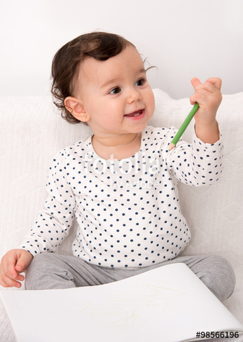 355x500 smiling baby girl sitting on the bed and drawing with a colored - Smiling Baby Drawing