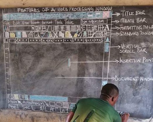 523x417 teacher hailed for drawing computer screen on chalkboard to teach - Teacher Teaching Students Drawing