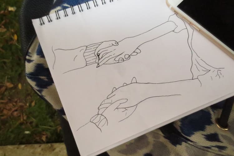 750x500 A Simple Drawing - Two Hands Drawing Each Other