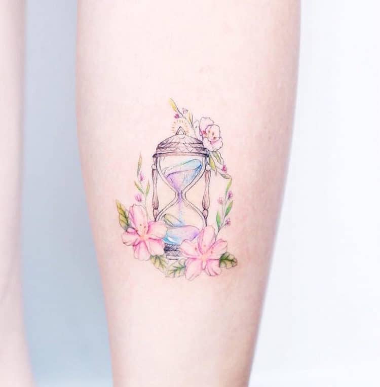 750x764 Watercolor Tattoos Beautifully Transform Bodies Into Living Art - Hourglass Watercolor Tattoo