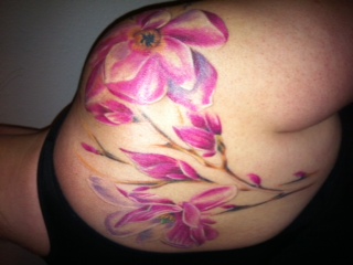320x240 Tattoo Of The Week Graduate Student Permanently Preserves Artwork - Magnolia Watercolor Tattoo