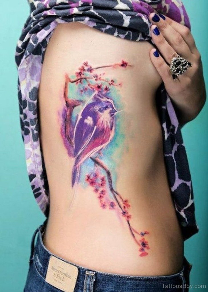 730x1024 Watercolor Bird Tattoo On Rib Tattoo Designs, Tattoo Pictures - Watercolor Bird Tattoo