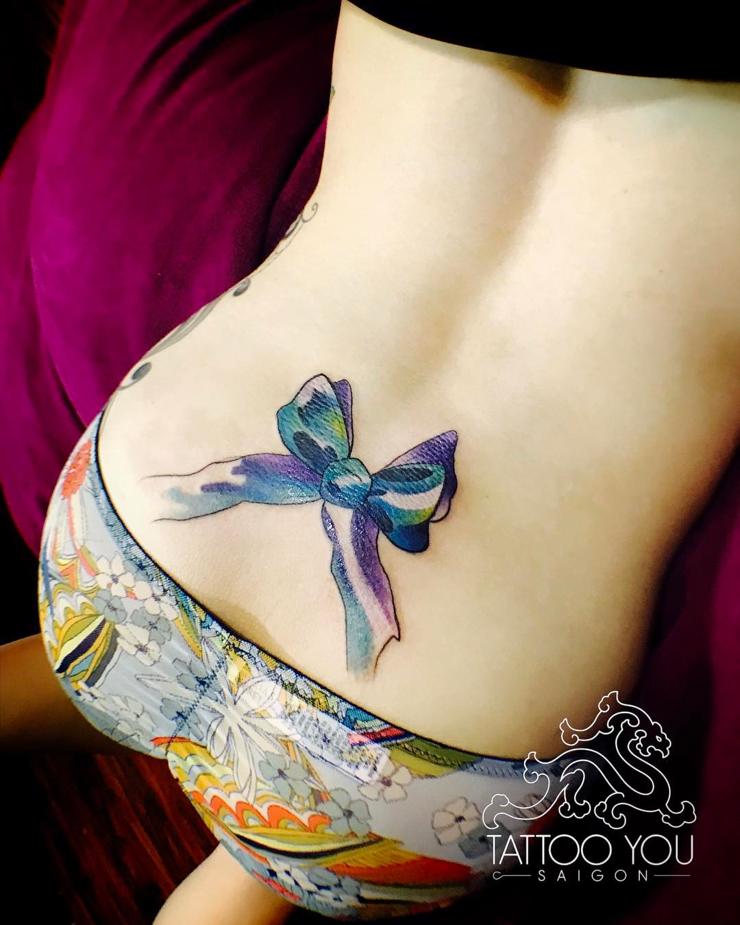 1080x1349 Lower Back Bow Tattoo With Using Watercolor - Watercolor Bow Tattoo