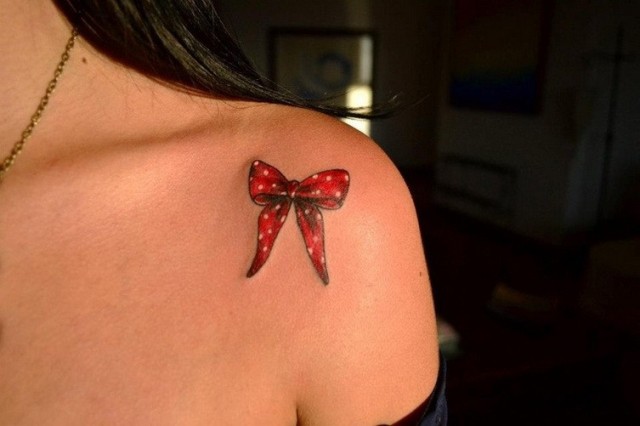 640x426 21 Small Bow Tattoo Ideas To Repeat - Watercolor Bow Tattoo