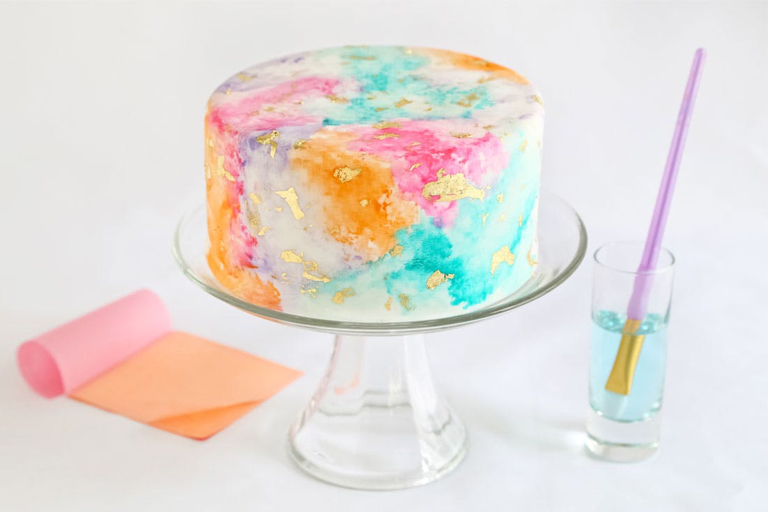 1100x733 How To Make A Gilded Watercolor Cake That Will Majorly Impress - Watercolor Cake