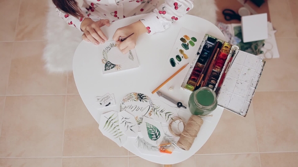 590x332 Girl Drawing With Brush And Watercolor On Paper, Handmade Holiday - Watercolor Paper Christmas Ornaments