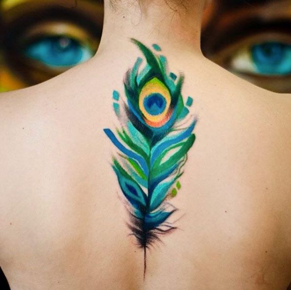 600x597 Beautiful Peacock Feather Tattoo Ideas And Their Meaning - Watercolor Peacock Tattoo