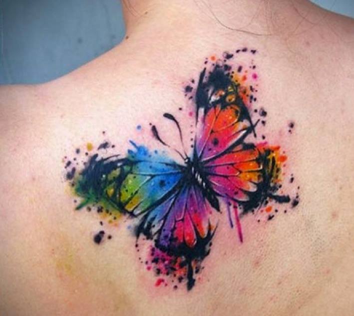 709x633 Awesome Watercolor Butterfly Tattoo On Upper Back - Watercolor Ribbon Tattoo