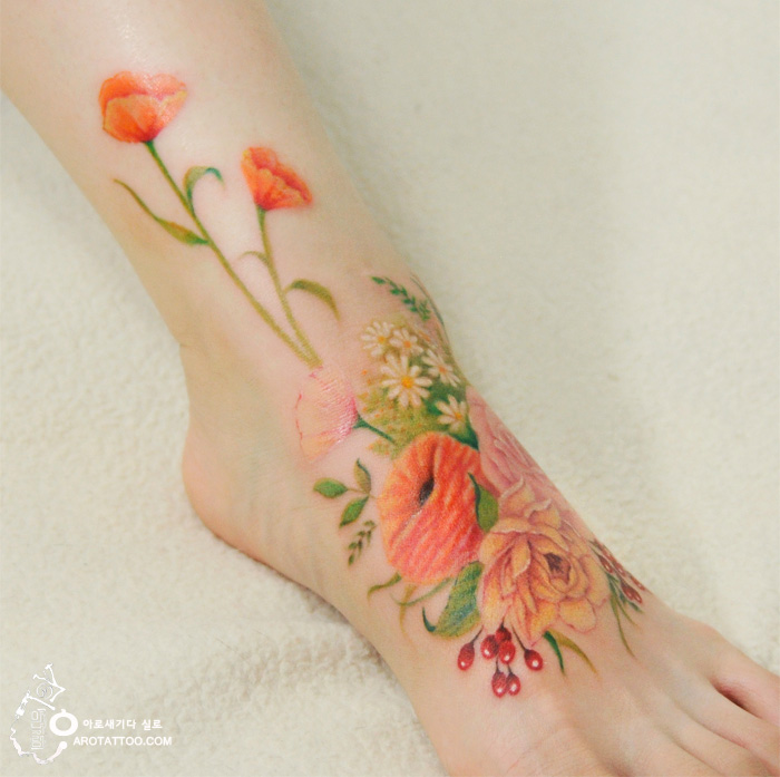 700x697 Colorful Flower Tattoos That Look Like Watercolor Paintings - Watercolor Tattoo Painting