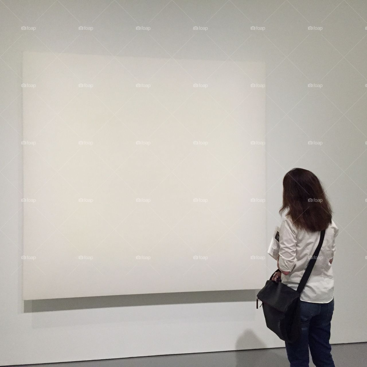 1280x1280 A Woman, Possibly A Teacher Or Student, Inspects A Blank - Blank Painting