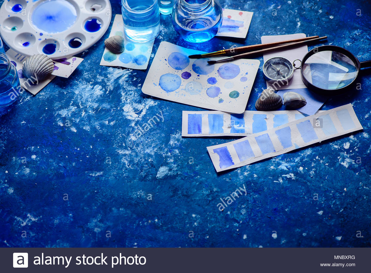 1300x957 Artist Workplace With Watercolor Sketches In Shades Of Blue - Blue Monochromatic Painting