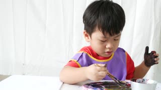 320x180 Cute Little Baby Boy Painting His Feet On A Large Blank White - Boy Painting