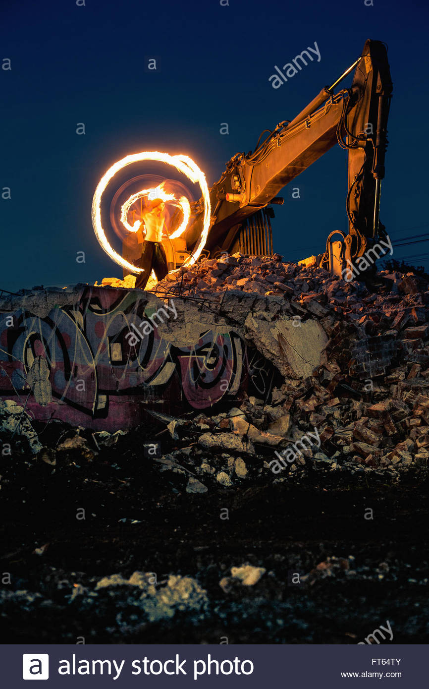 866x1390 Man Doing Light Painting On Broken Building Ruins By Bulldozer - Bulldozer Painting