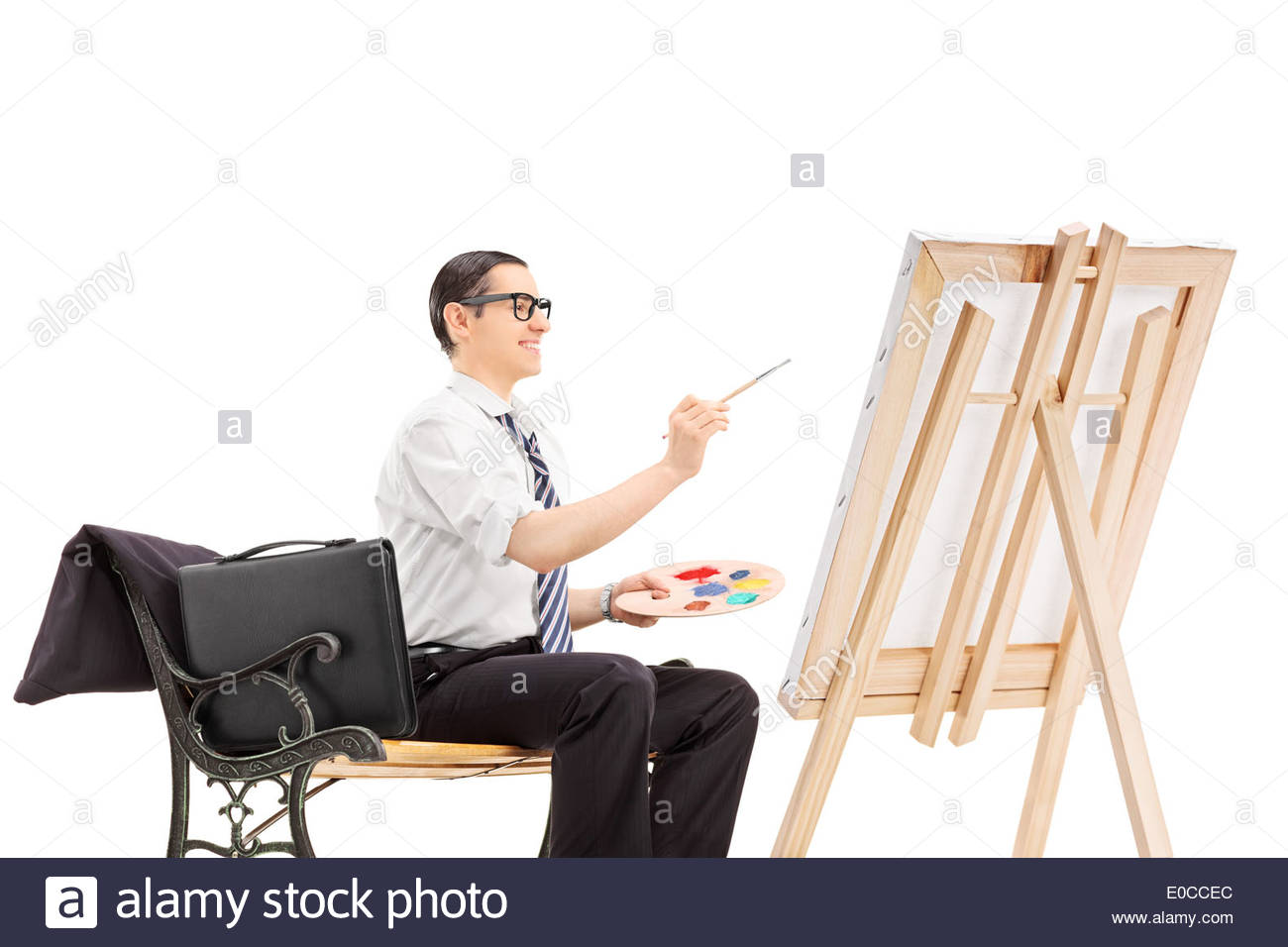 1300x956 Male Businessman Painting On A Canvas Stock Photo 69114708 - Businessman Painting