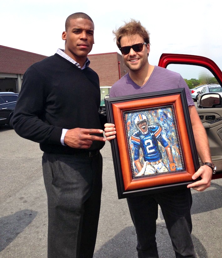 709x823 Cam Newton Poses With A Painting Of Himself - Cam Newton Painting