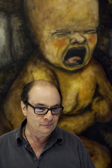 466x700 Man In Front Of Painting Of Crying Baby By Jack Mcconnell Artbox - Crying Baby Painting