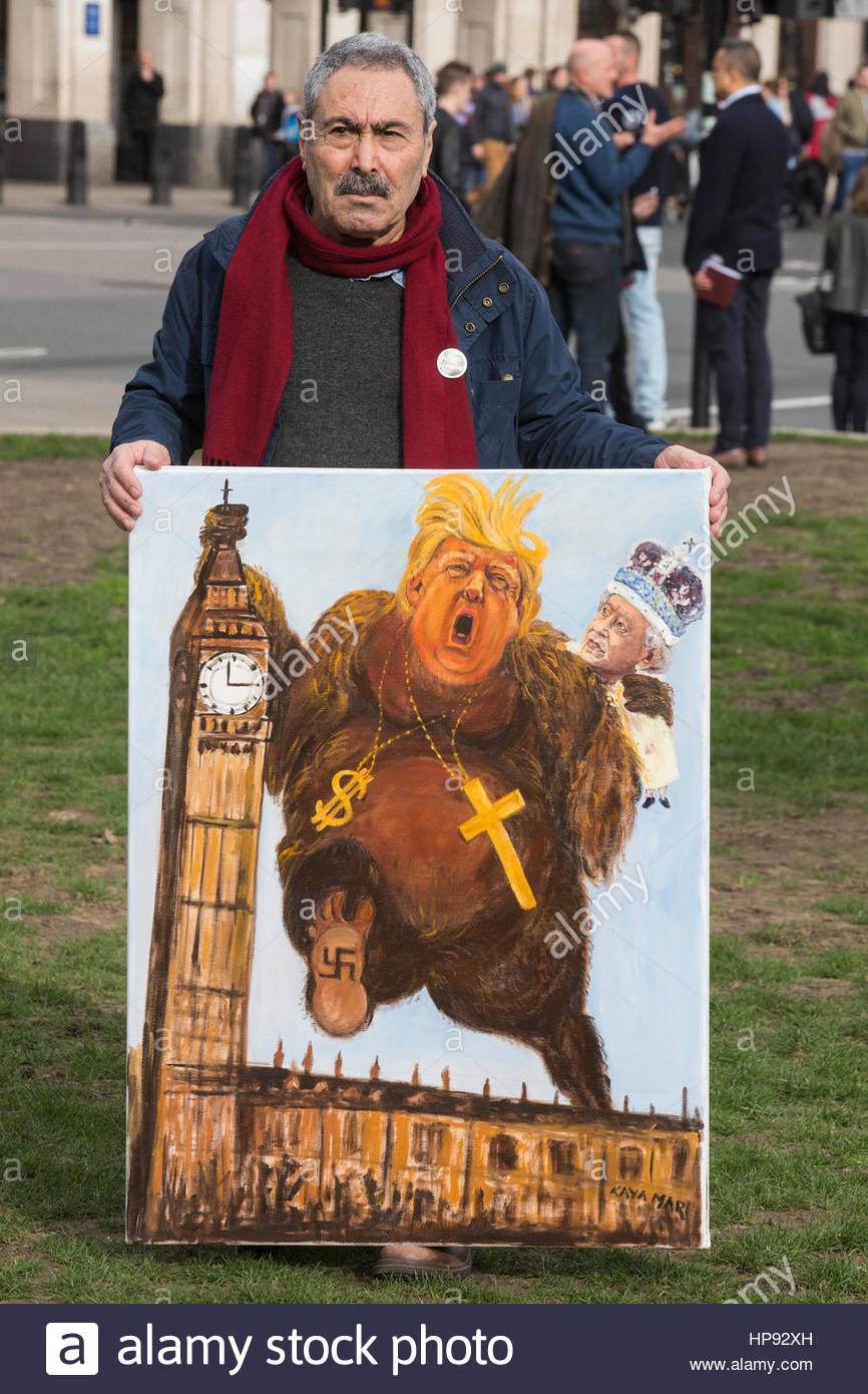 866x1390 London, Uk. 20th Feb, 2017. Political Artist Kaya Mar Holds Up - Donald Trump Oil Painting