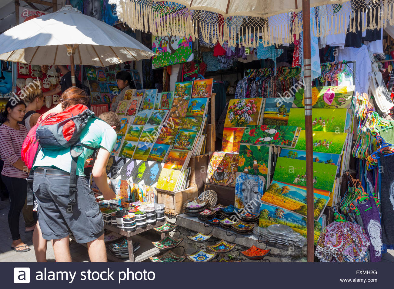 1300x956 Painting Vendor In Bali Ubud Traditional Market, Ubud, Bali Stock - Flea Market Painting