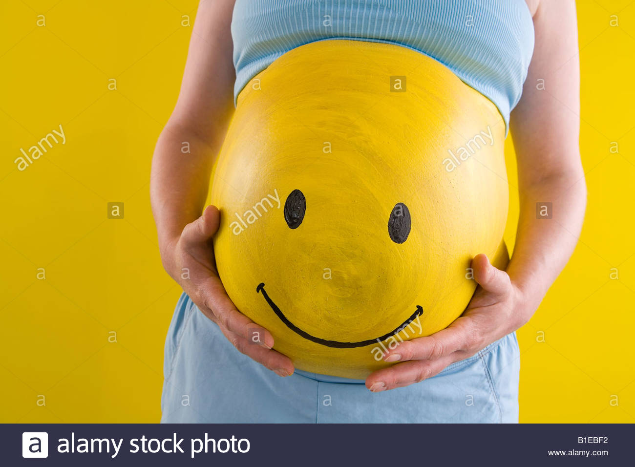 1300x956 Pregnant Stomach Painting Stock Photos Amp Pregnant Stomach - Happy Face Painting