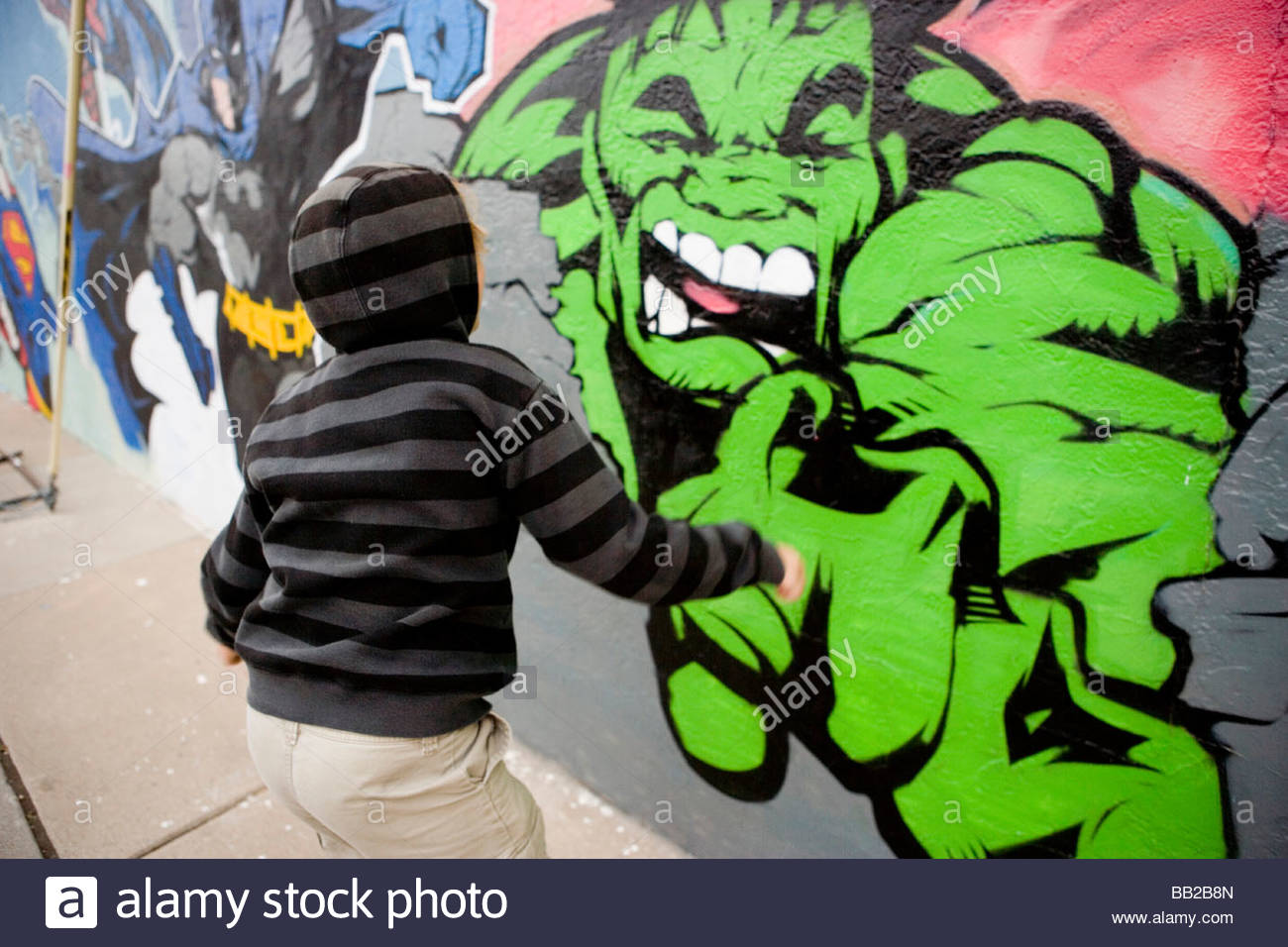 1300x956 Boy Running Up To A Painting Of The Incredible Hulk On A Wall - Incredible Hulk Painting