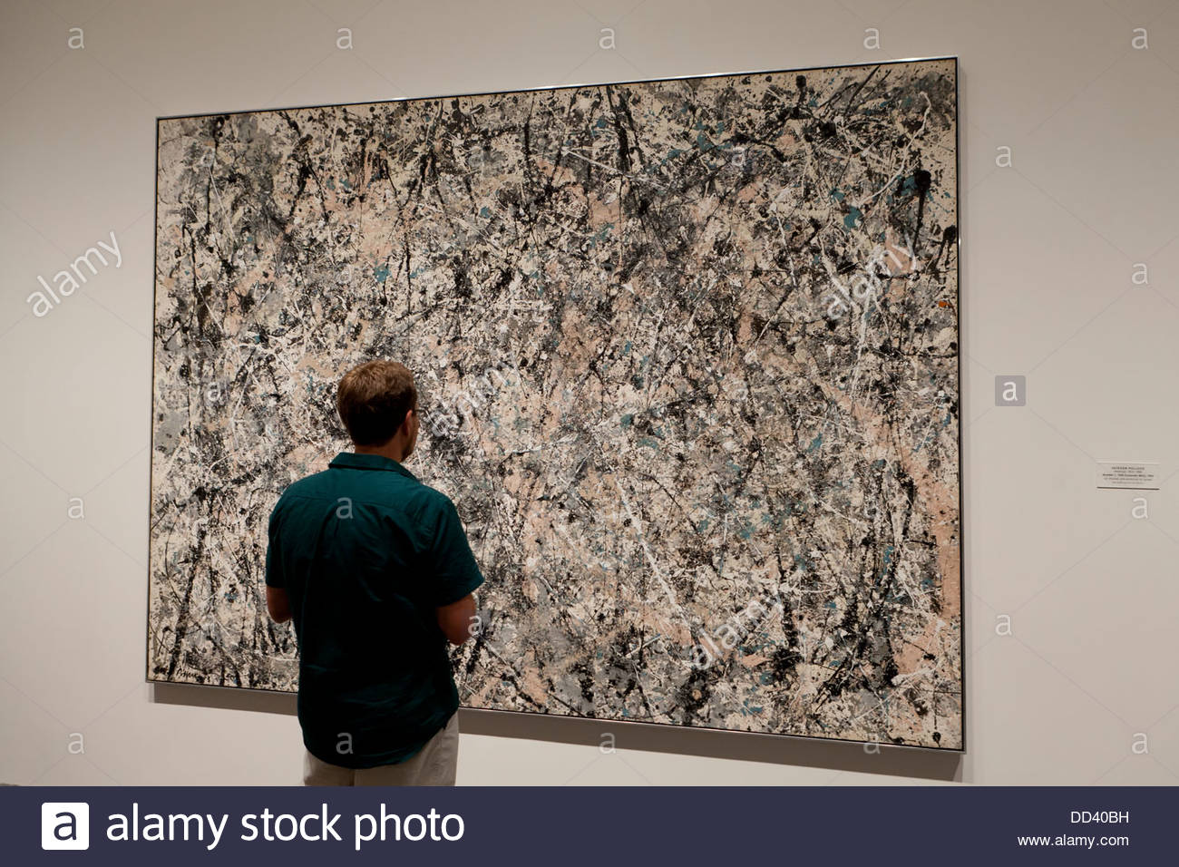 1300x956 Man Viewing Jackson Pollock Number 1 (Lavender Mist - Lavender Mist Painting