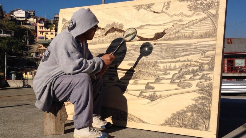 800x450 This Artist Uses His Magnifying Glass To Burn Pictures, Not Ants - Magnifying Glass Painting