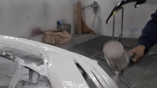 320x180 Painting Car Parts Stock Video Footage - Painting Car Parts