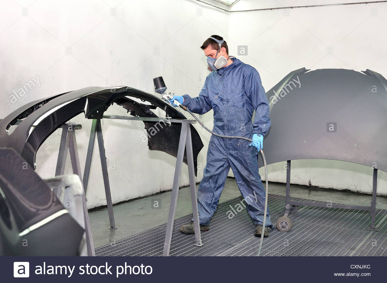 1300x953 Worker Painting Car Parts Stock Photo 50877440 - Painting Car Parts