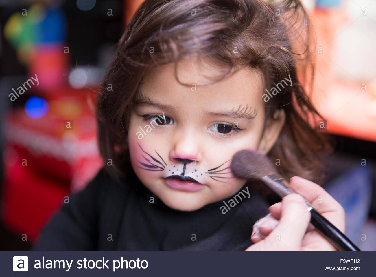 1300x956 Woman Painting Little Girl's Face Like A Cat Stock Photo 92151054 - Painting Of Girl Face