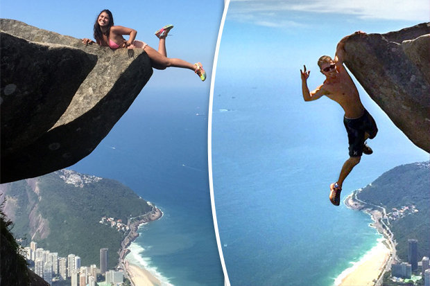 620x413 Couple Hanging Off Cliff In Brazil Is Not What You Think It Is - Painting Of Man Looking Over Cliff