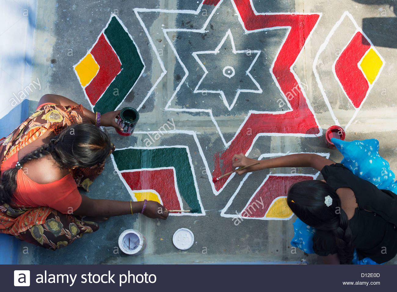 1300x955 Young Indian Woman And Teenage Girl Painting A Rangoli Design - Rangoli Painting