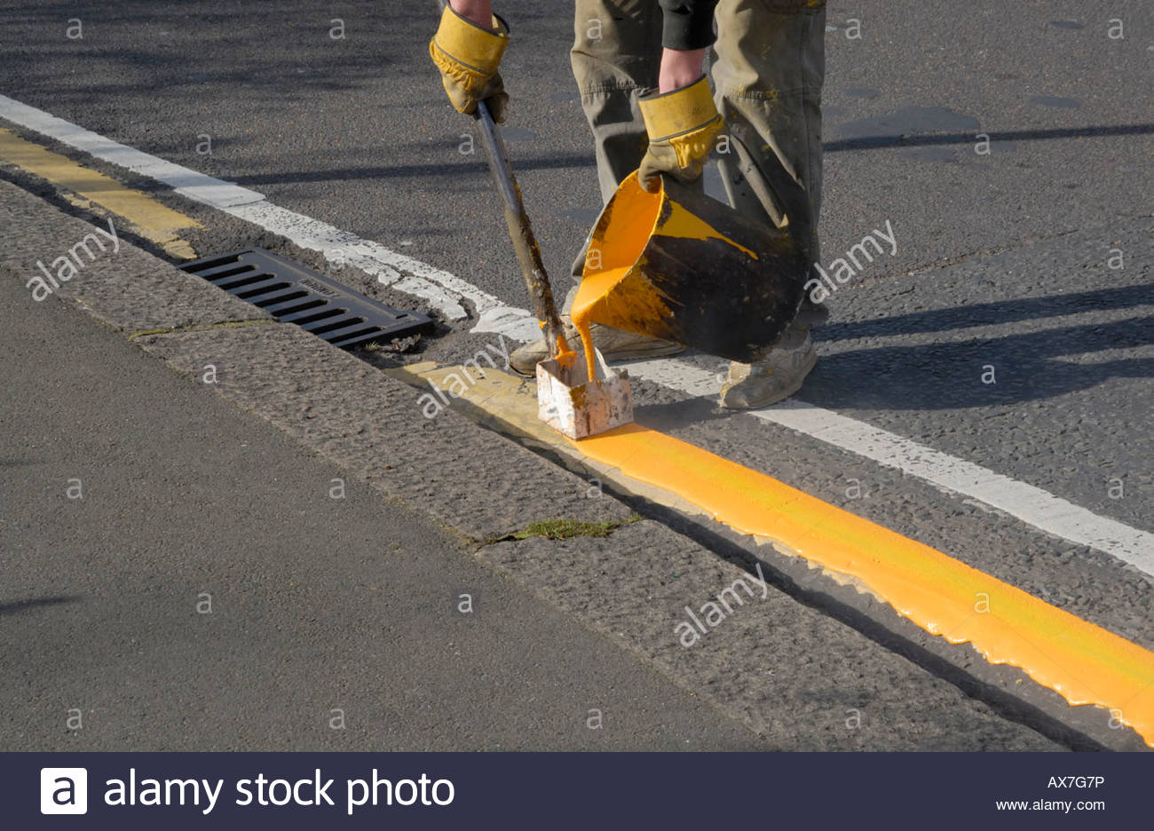 1300x936 Hand Painting Yellow Line On Road With Kettle Of Hot Paint - Road Painting