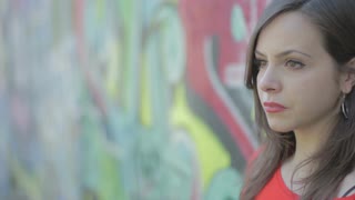 320x180 Portrait Sad Woman Is Crying Leaning Against A Wall Painted - Sad Woman Painting