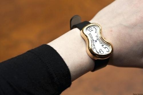 500x333 Salvador Dali Melting Clocks Meaning Wrist Watch Poster - Salvador Dali Clock Painting