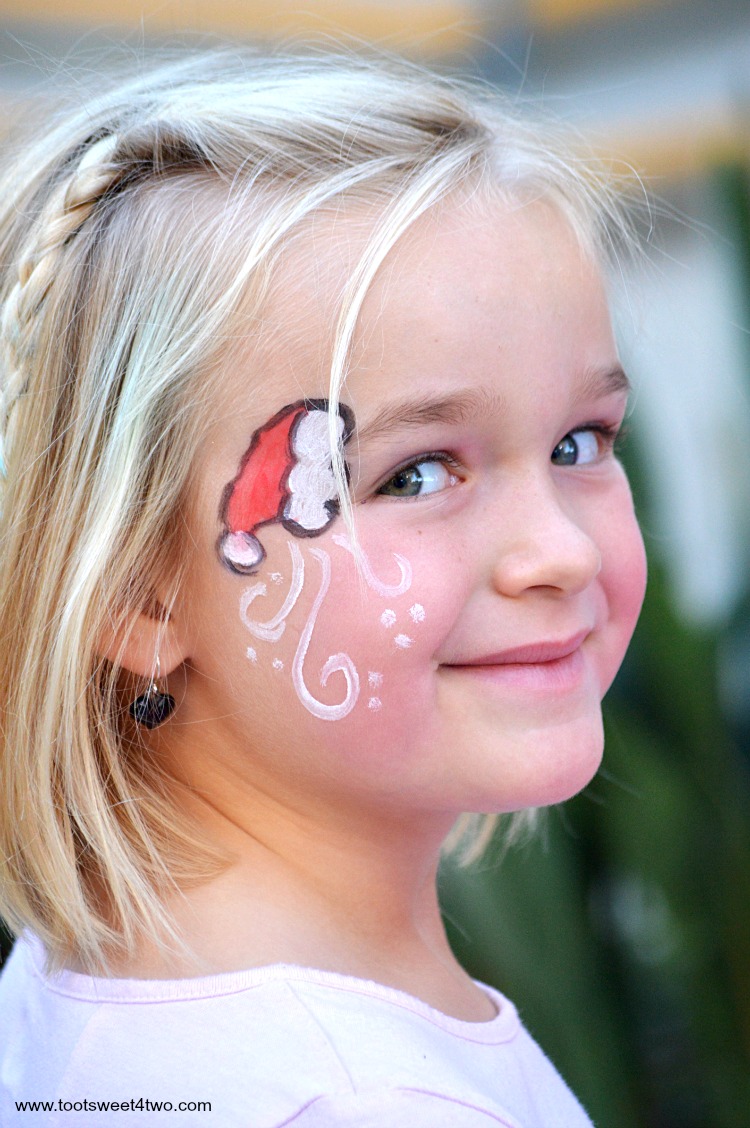 750x1128 Princess Sweetie Pie With Santa Hat Face Painting - Santa Face Painting