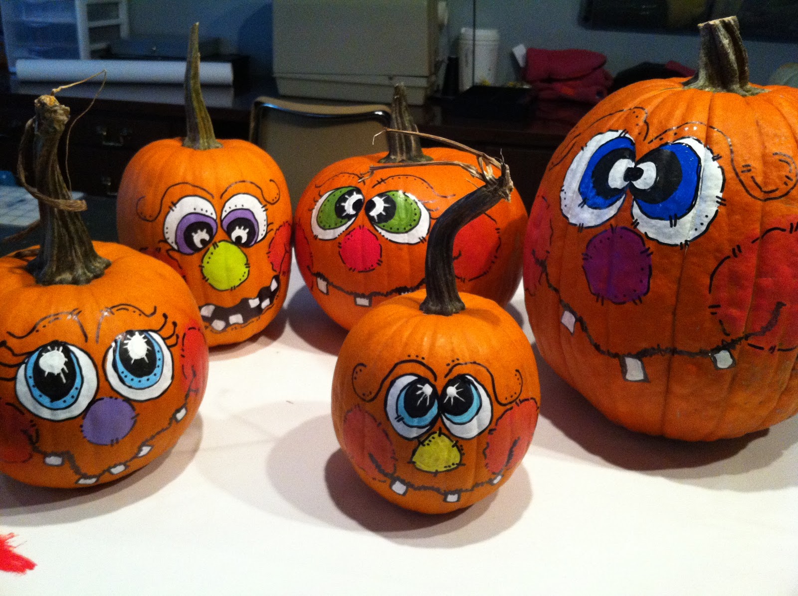 Our Garden Path Painting Pumpkin Faces - Scary Painting Pumpkins. 