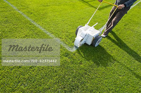 450x299 Man Painting Lines On Soccer Field, Salzburg, Austria - Soccer Field Painting